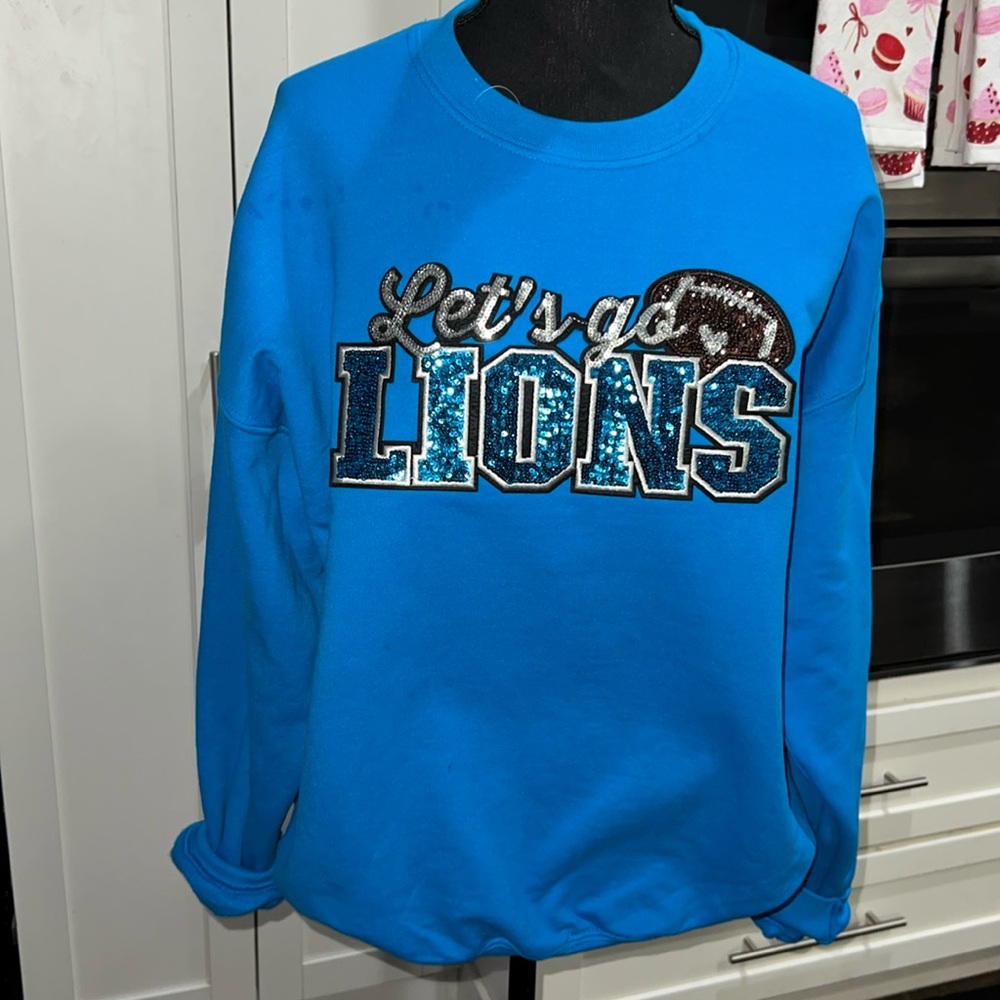 Let’s go lions blue sequence crew neck